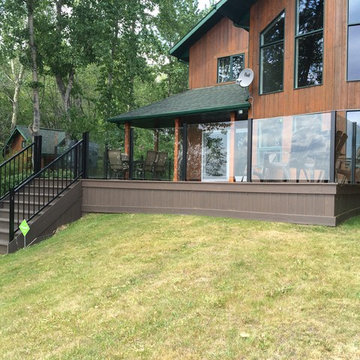 Wrap Around Composite Deck w/ Aluminum Frame-less Glass Railing in Seba Beach