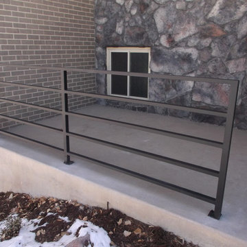wrought iron and pre-fab steel fences