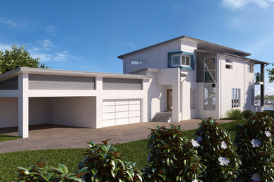 Photo of a white contemporary two floor house exterior in Newcastle - Maitland with a flat roof.