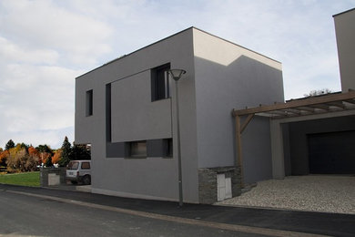 Idée de décoration pour une façade de maison minimaliste.