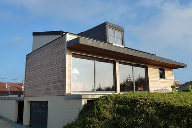 Exemple d'une façade de maison nature.