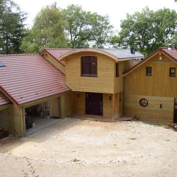 Construction d'une maison ossature bois avec piscine couverte