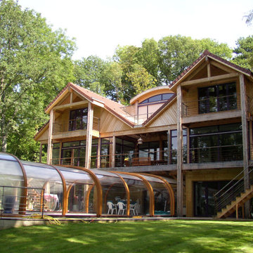 Construction d'une maison ossature bois avec piscine couverte
