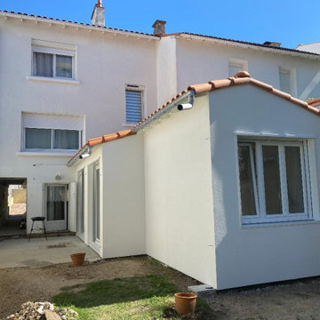 Extension en ossature bois, et ITE avec enduit de finition à Royan