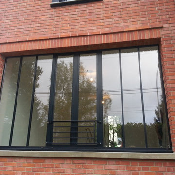 Extension style atelier avec façade brique