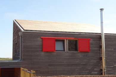 La maison au toit en bois