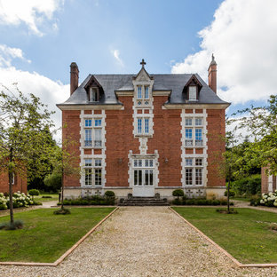 Réalisation d'une façade de maison victorienne à deux étages et plus avec un toit à quatre pans et un toit en shingle.