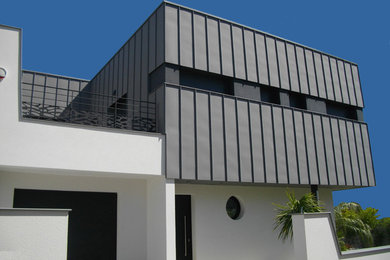 Idée de décoration pour une façade de maison design.