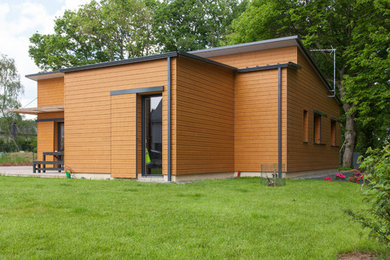 Exemple d'une façade de maison nature.