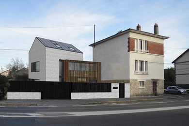 Exemple d'une façade de maison chic de taille moyenne.