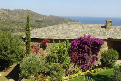 Inspiration for a mediterranean house exterior in Corsica.