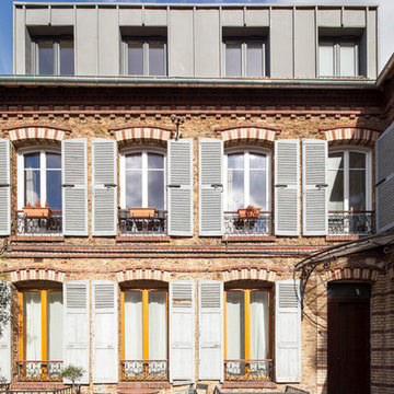 vue façade après travaux - surélévation zinc