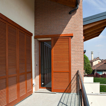 Costruire con legno e mattoni. Edificio residenziale a Rodano - MQ 800