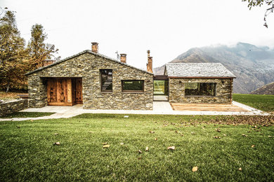 Design ideas for a rustic house exterior in Milan.