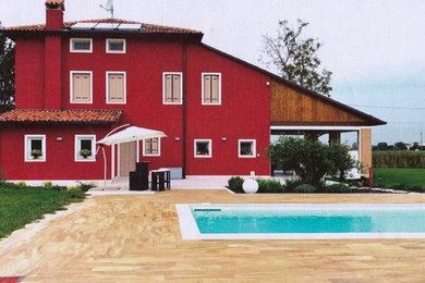 Idee per la villa rossa moderna di medie dimensioni