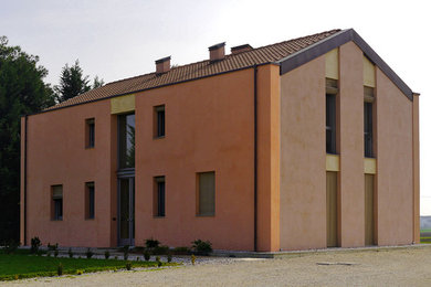 Modelo de fachada de estilo de casa de campo de tamaño medio de dos plantas con tejado a doble faldón