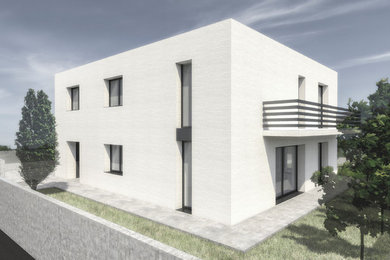 Foto de fachada de casa blanca minimalista grande de dos plantas con revestimientos combinados, tejado plano y techo verde