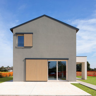 Ispirazione per la villa grigia contemporanea a due piani con tetto a capanna