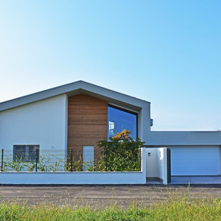 Idee per la villa grigia contemporanea a due piani con tetto a capanna