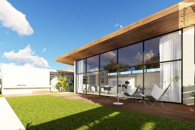 Diseño de fachada de casa beige moderna grande de una planta con revestimiento de hormigón, tejado de un solo tendido y tejado de varios materiales
