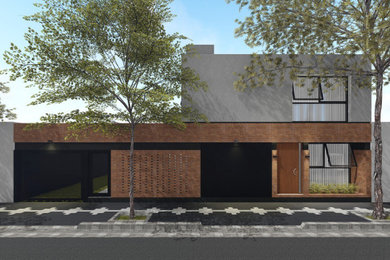 Imagen de fachada minimalista de dos plantas con revestimiento de ladrillo, tejado plano y tejado de varios materiales