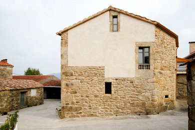 Design ideas for a rustic house exterior in Barcelona.