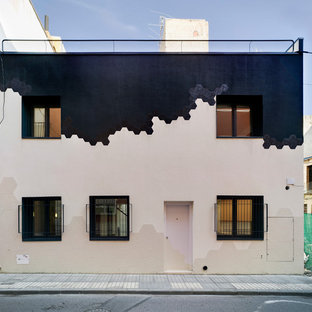 Foto de fachada de casa multicolor, minimalista, de tamaño medio, de dos plantas, con revestimientos combinados y tejado plano