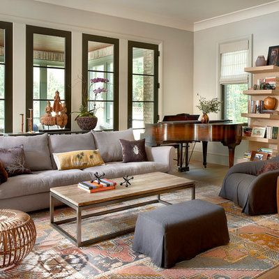 Large transitional open concept light wood floor family room photo in Chicago with gray walls and a music area