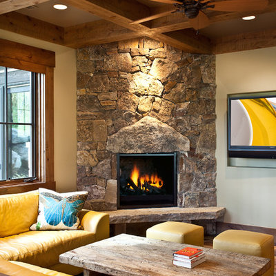Family room - rustic family room idea in Salt Lake City with a corner fireplace