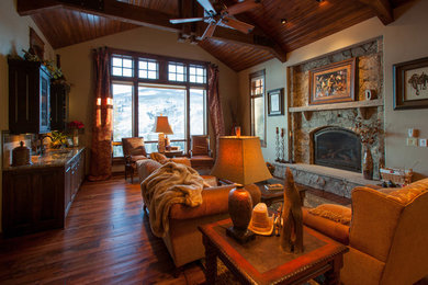 Mountain style family room photo in Denver