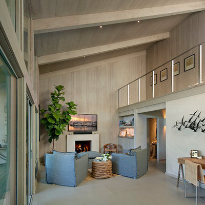 Inspiration for a mid-sized contemporary open concept porcelain tile family room remodel in Santa Barbara with gray walls, a standard fireplace and a wall-mounted tv