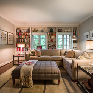 Family room library - mid-sized traditional enclosed dark wood floor family room library idea in St Louis with gray walls