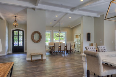 Mid-sized elegant open concept light wood floor family room photo in Phoenix with gray walls