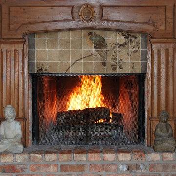 Asian tile mural above fireplace
