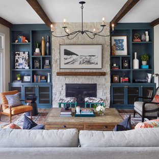 Family room - large transitional open concept medium tone wood floor and brown floor family room idea in Denver with gray walls, a standard fireplace, a stone fireplace and a wall-mounted tv