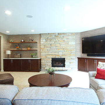 Asymmetrical Built In Surround Stacked Stone Fireplace
