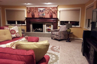 Example of a mid-sized transitional enclosed carpeted family room design in Grand Rapids with yellow walls, a standard fireplace, a tile fireplace and a tv stand