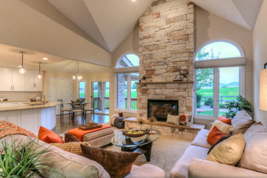 Example of a transitional family room design in Denver