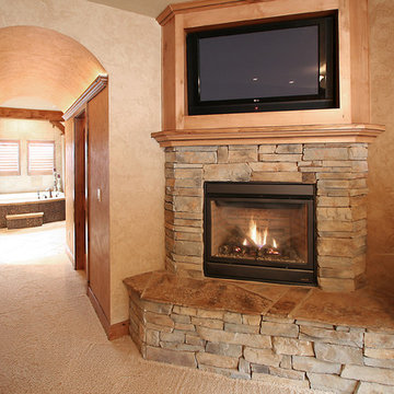 Beautiful stone fireplace and textured walls