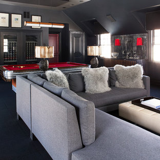 Transitional open concept black floor game room photo in New York with black walls