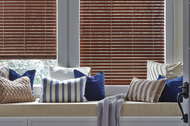 Blue and Tan Window Seat with Wood Blinds