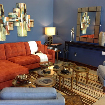 Blue family room with Orange sofa