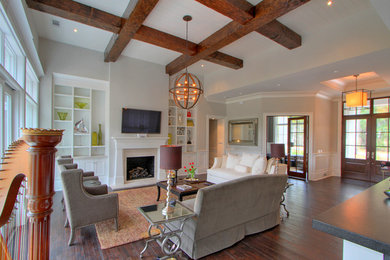 Example of a large transitional open concept dark wood floor family room design in Atlanta with gray walls, a standard fireplace, a stone fireplace and a wall-mounted tv