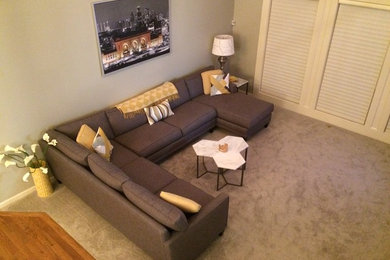 Example of a mid-sized transitional open concept carpeted family room design in Kansas City with gray walls and a two-sided fireplace