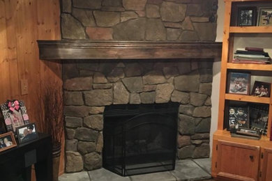 Example of a mountain style family room design in Cleveland