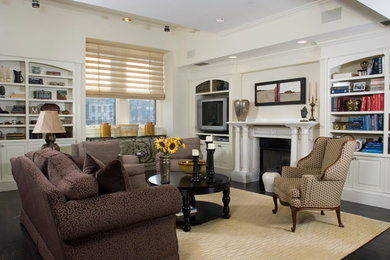 Example of a mid-sized trendy open concept dark wood floor game room design in Boston with white walls, a standard fireplace, a plaster fireplace and a media wall