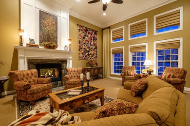 Example of a large classic open concept carpeted family room design in Minneapolis with brown walls, a two-sided fireplace, a stone fireplace and no tv