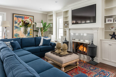 Example of a classic family room design in Boston