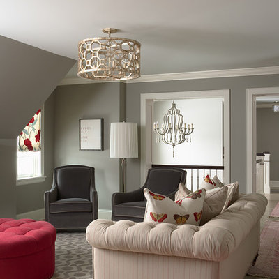 Example of a classic medium tone wood floor family room design in Minneapolis with gray walls