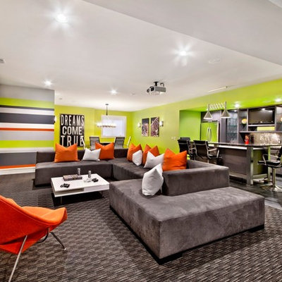 Inspiration for a mid-sized contemporary open concept carpeted family room remodel in Detroit with multicolored walls, a bar, no fireplace and a wall-mounted tv